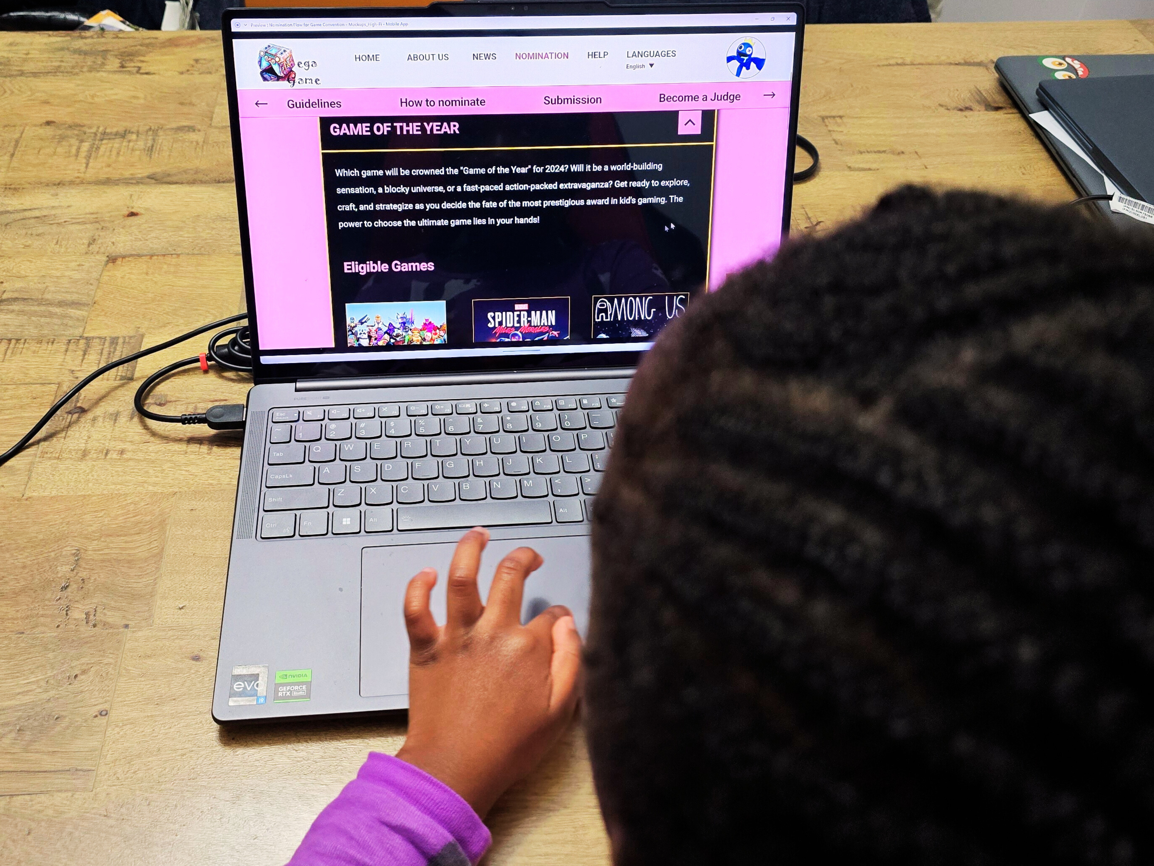 photo of a Kid using Mega Game Website